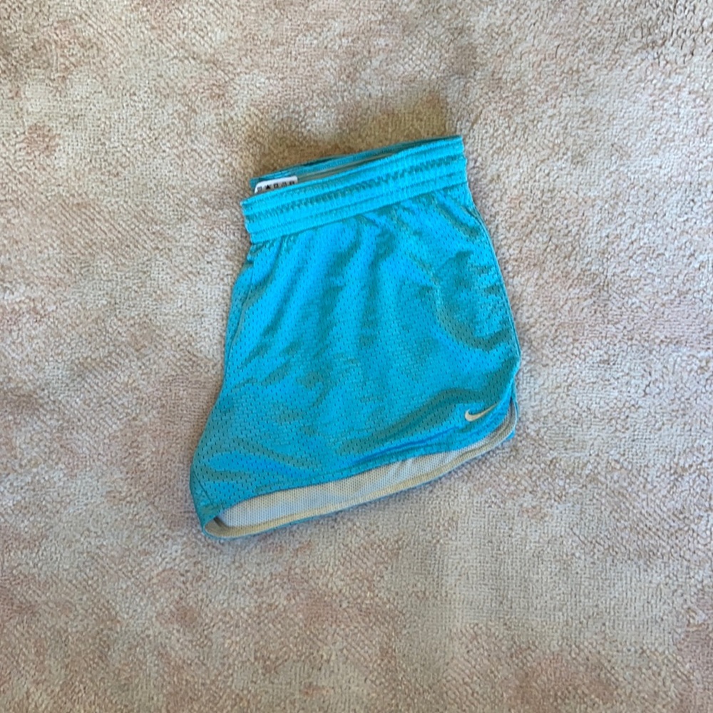 Turquoise Nike running shorts